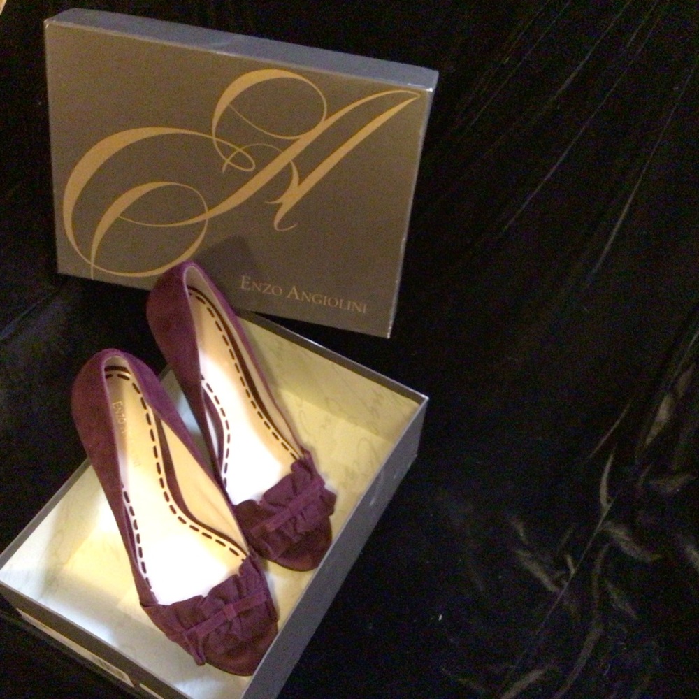 Purple open toed spiked heels